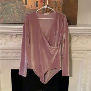 Pale pink velvet bodysuit from Madewell.